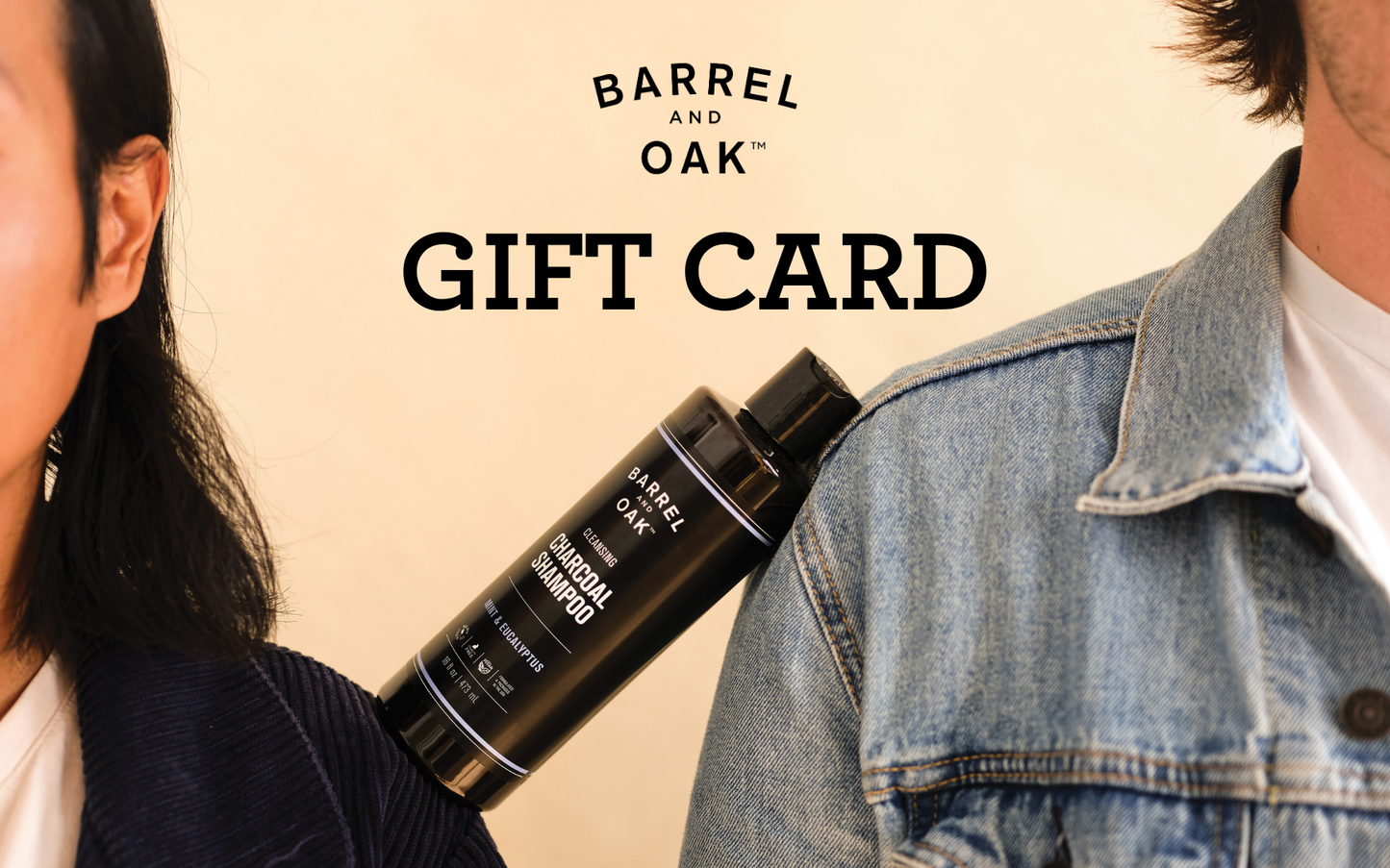 A person in a denim jacket and another in a dark sweater pose with a Barrel & Oak Gift Card displayed above them on a beige background.