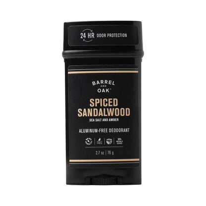 Barrel and Oak’s Aluminum Free Deodorant - Spiced Sandalwood 2.7 oz. offers 24-hour odor protection with sea salt and amber in a black, minimalist package featuring gold and white text; it’s natural and aluminum-free.