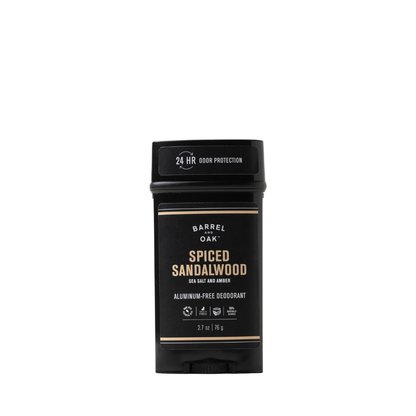 The Aluminum Free Deodorant - Spiced Sandalwood 2.7 oz delivers 24-hour odor protection with a vegan, aluminum-free formula for clean, natural freshness. The black stick features gold and white text.