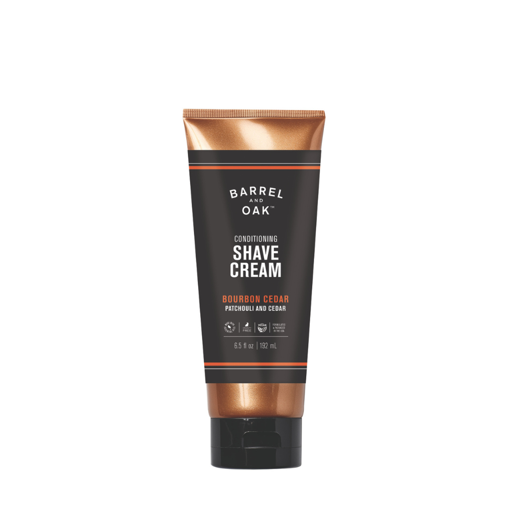 Barrel and Oak Conditioning Shave Cream - Bourbon Cedar (6.5 fl oz) features hemp seed oil in a sleek black tube with copper and white accents, designed for a smooth, comfortable shave.