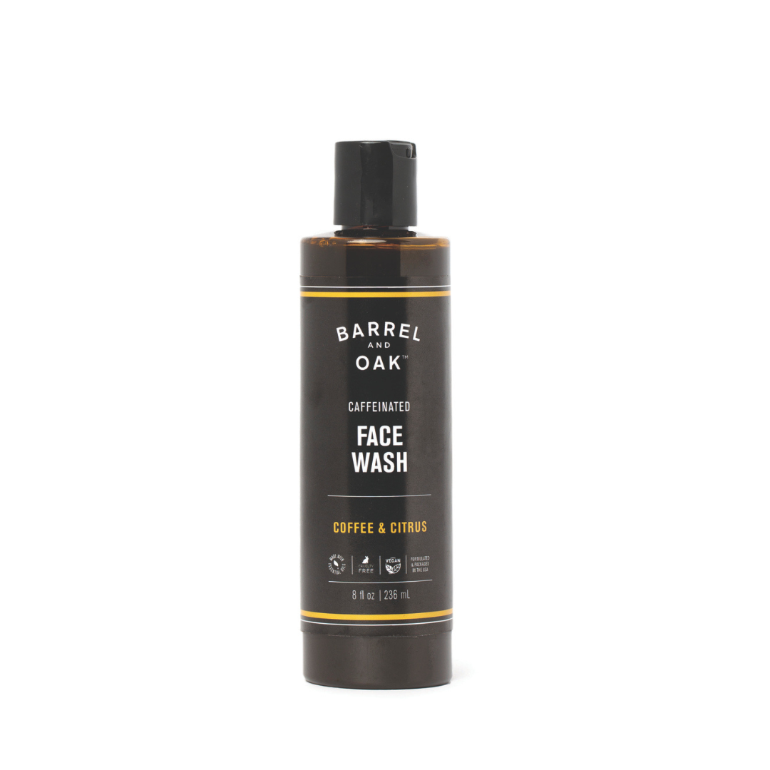 An 8 oz. bottle of Caffeinated Coffee & Citrus Face Wash stands upright, featuring a black label with white and yellow text, against a plain white background.